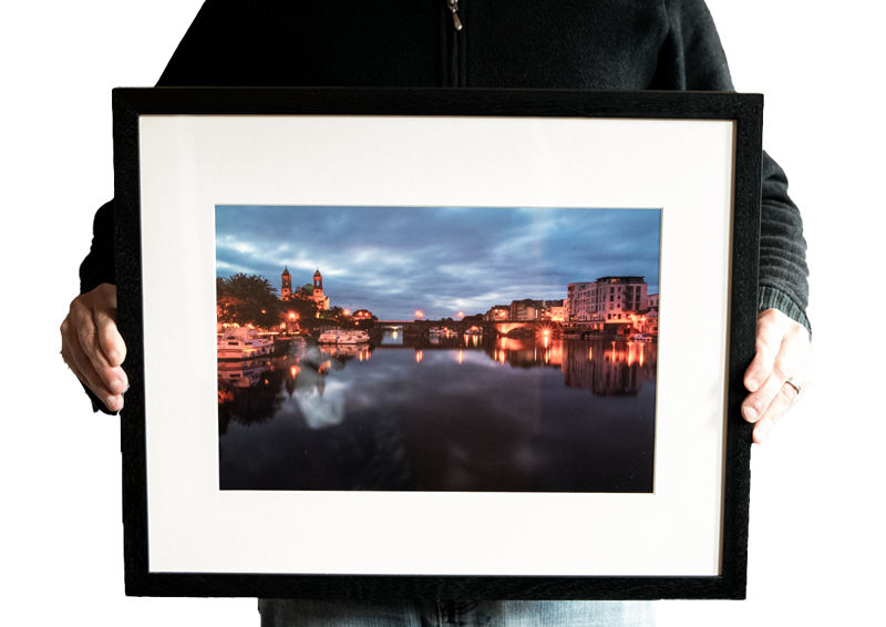 Large Framed Print in a Black Wood Frame and White Matting