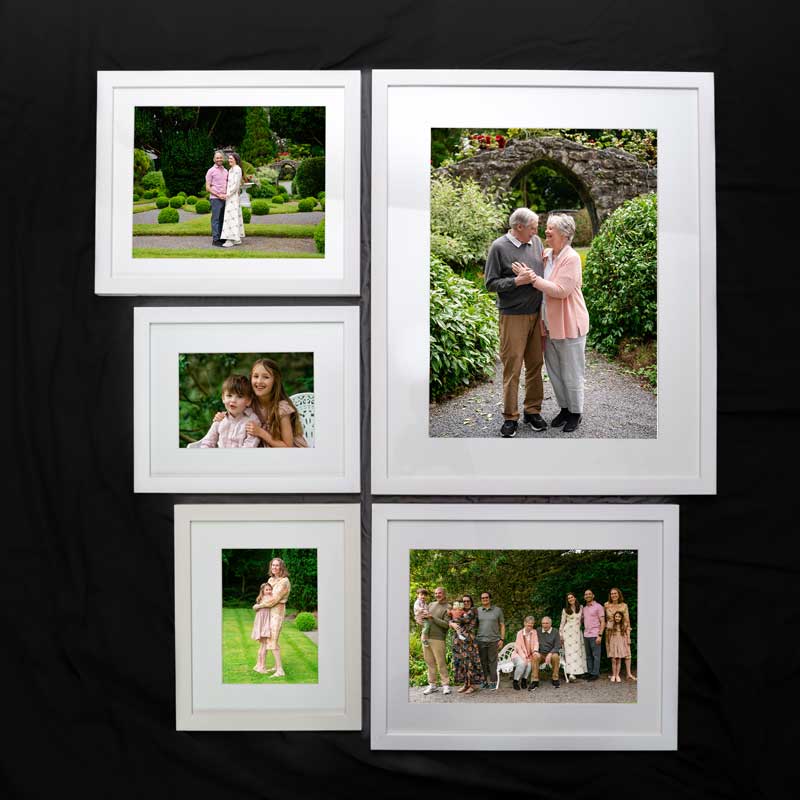 Wall art design using framed prints of multiple sizes